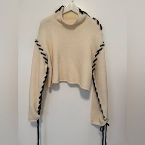Cream Sweater with Black Accents